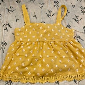 I am selling a yellow Francesca’s shirt! It is a medium and has never been worn!